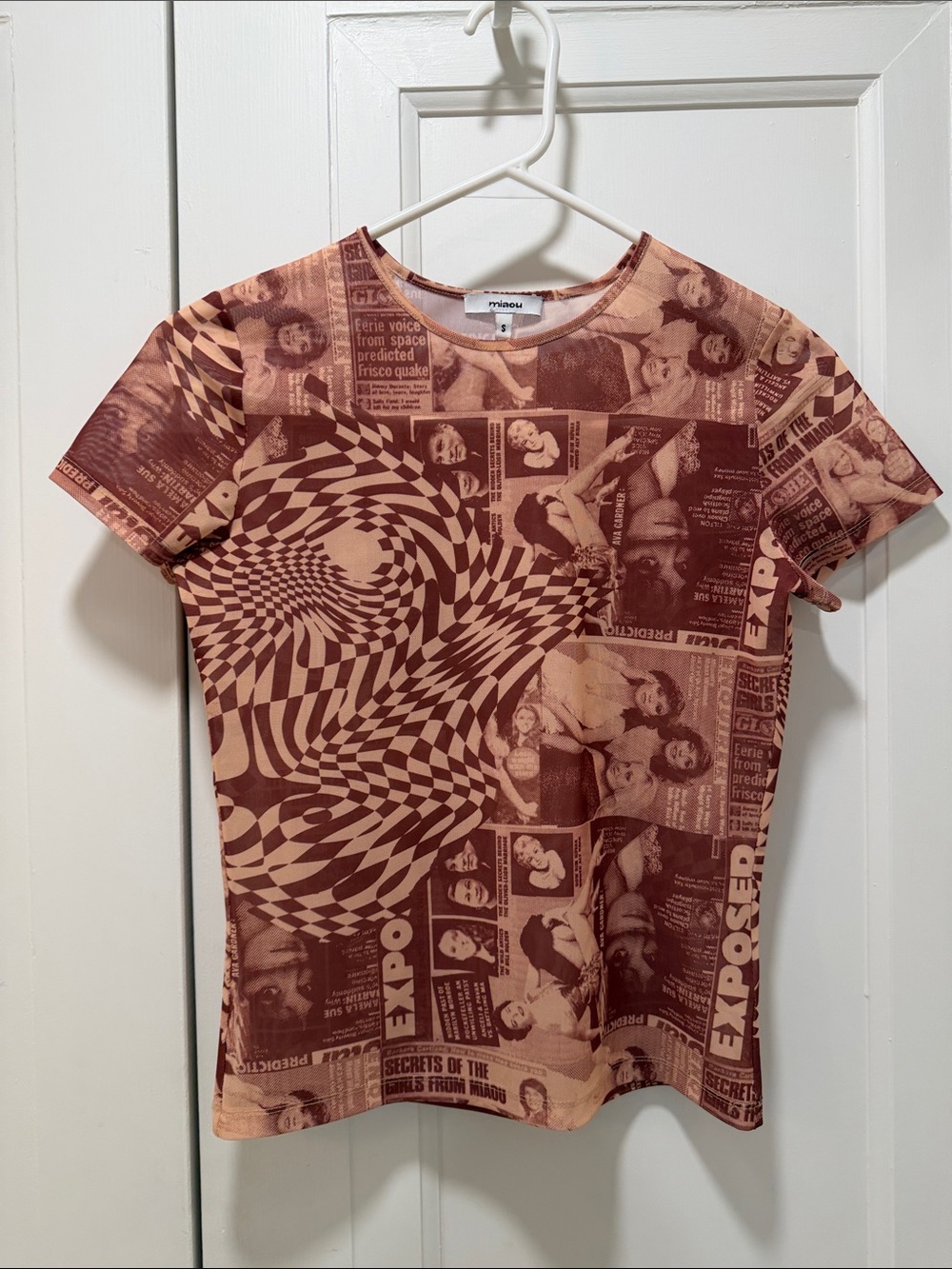Miaou Mesh Tee featuring a newspaper graphic.